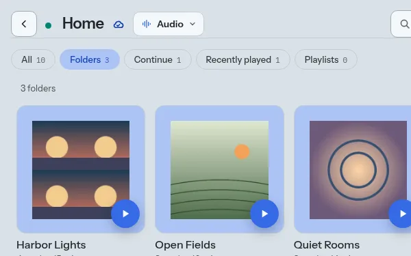 The Audio mode: three music folders shown as cards with their covers.